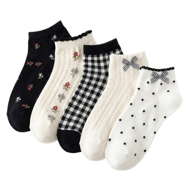 5-pair pack of Coquette ruffle ankle socks featuring floral prints, polka dots, gingham bows, and cottagecore styles.