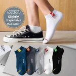 A lifestyle shot of white Men's Short Socks styled with casual sneakers, alongside a 5-pair bundle display.