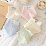 5-pair bundle of Kawaii puppy ankle socks in pastel colors with paw print and puppy embroidery.