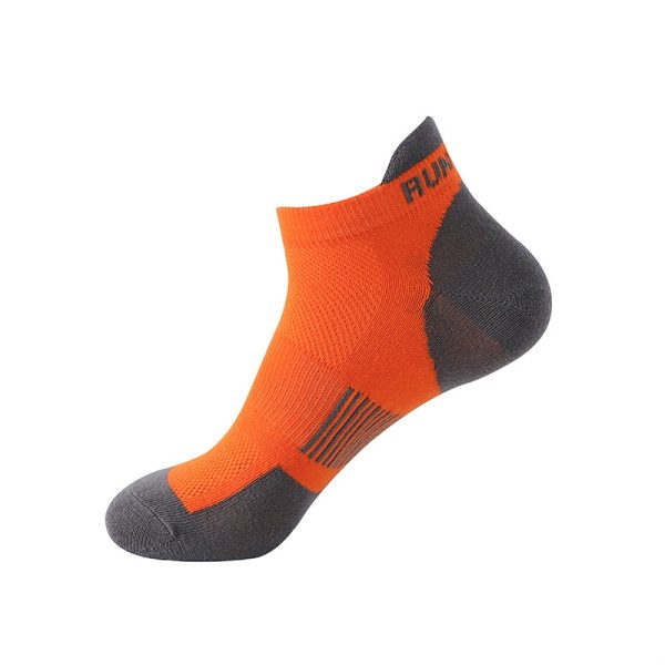 A single orange athletic running sock with gray heel and toe reinforcement.